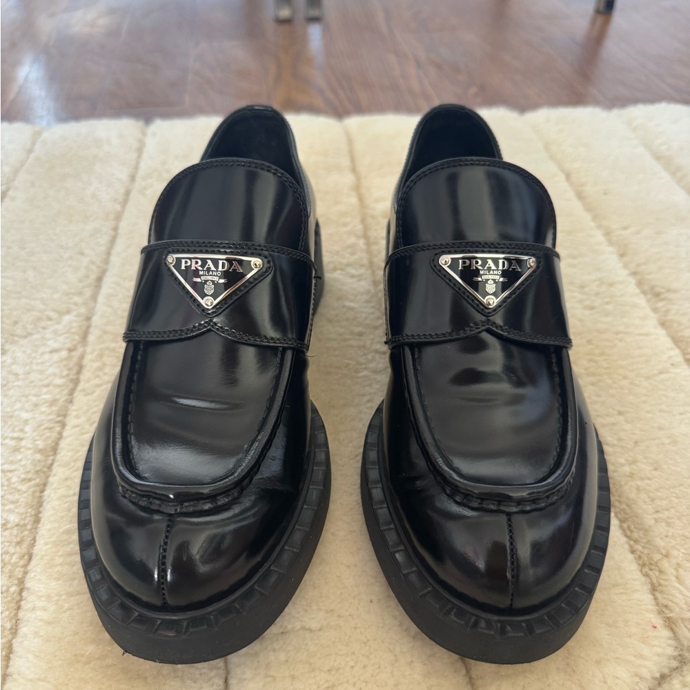 Prada triangle brushed black loafers